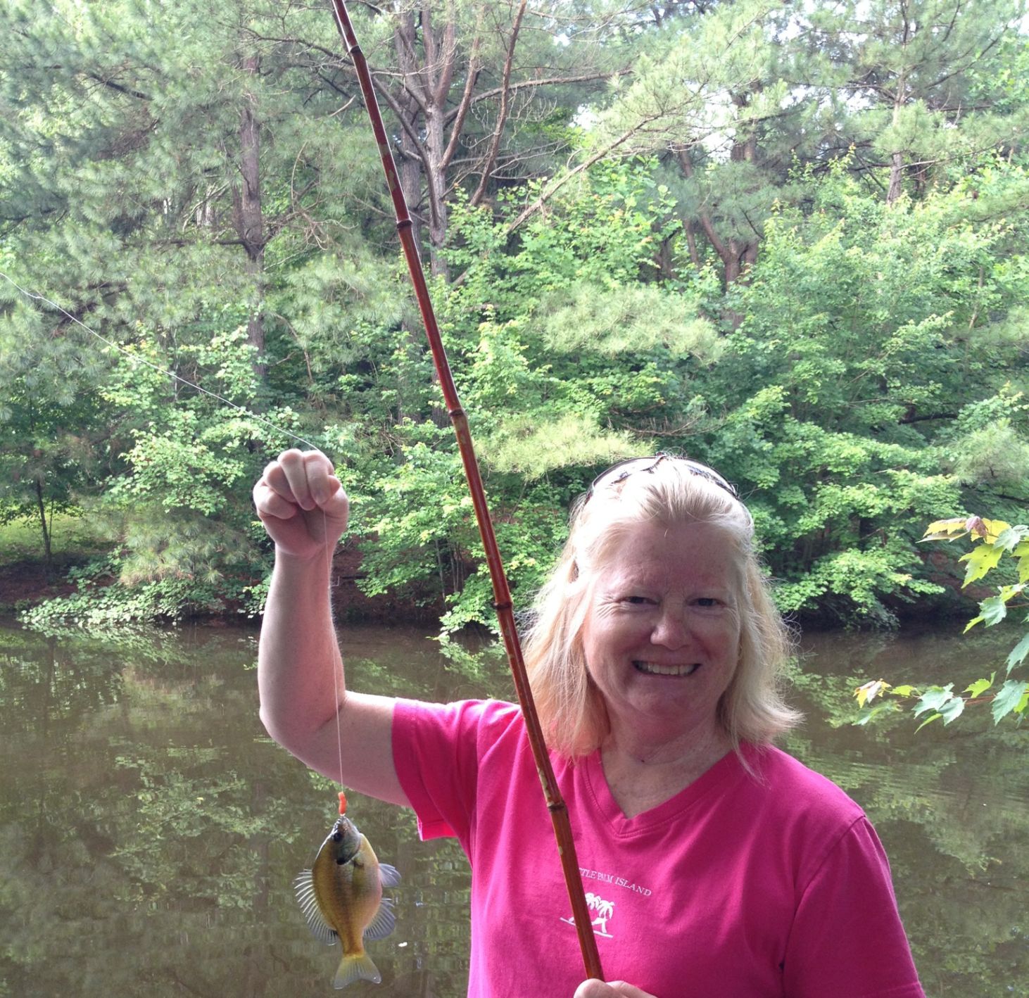 Photo_Verdun Article Executive Director Honore Hastings Catching a Fish at Verdun.JPG